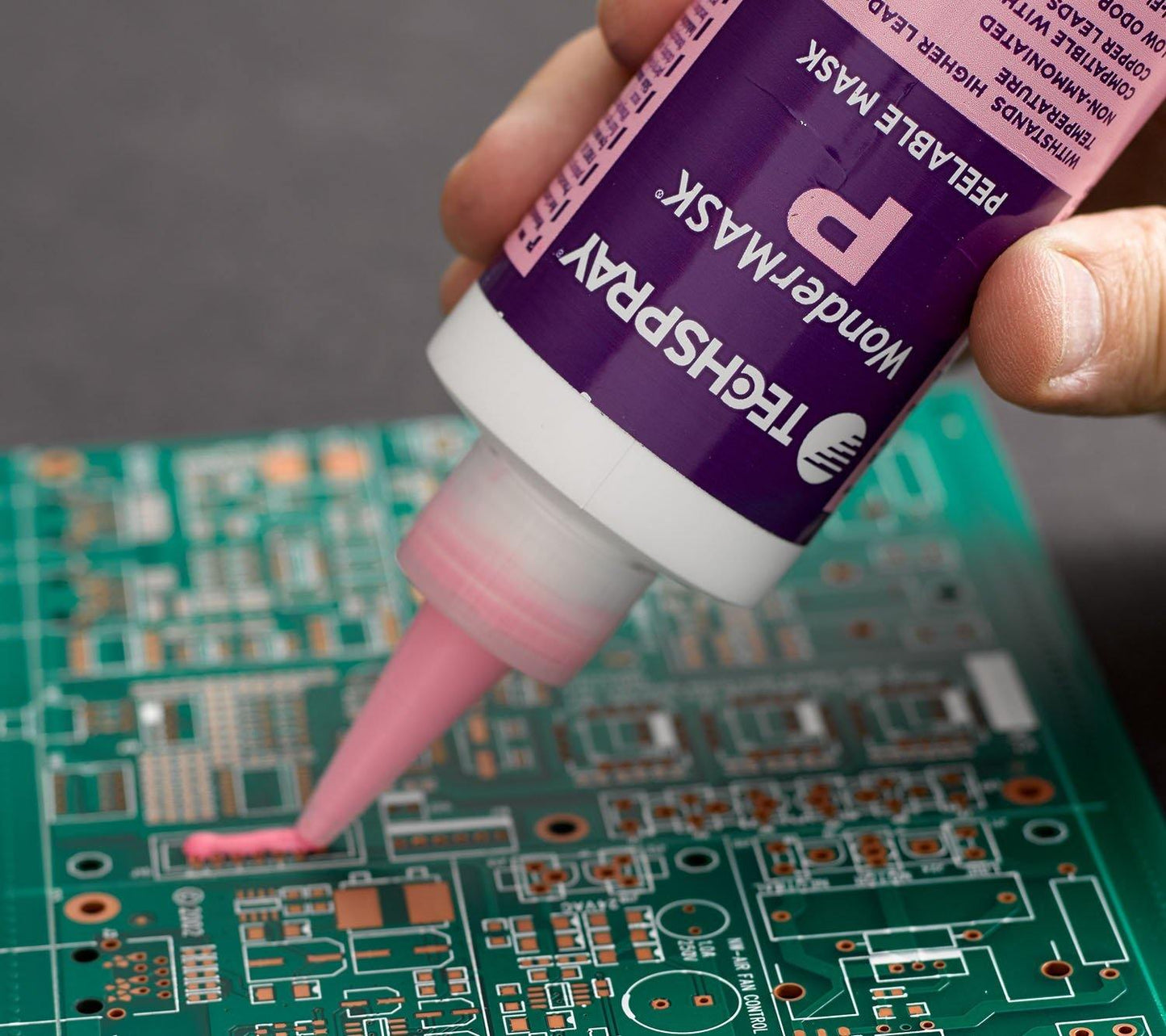 Techspray Wondermask P Peelable Solder Mask (8 Oz) in use on PCB board