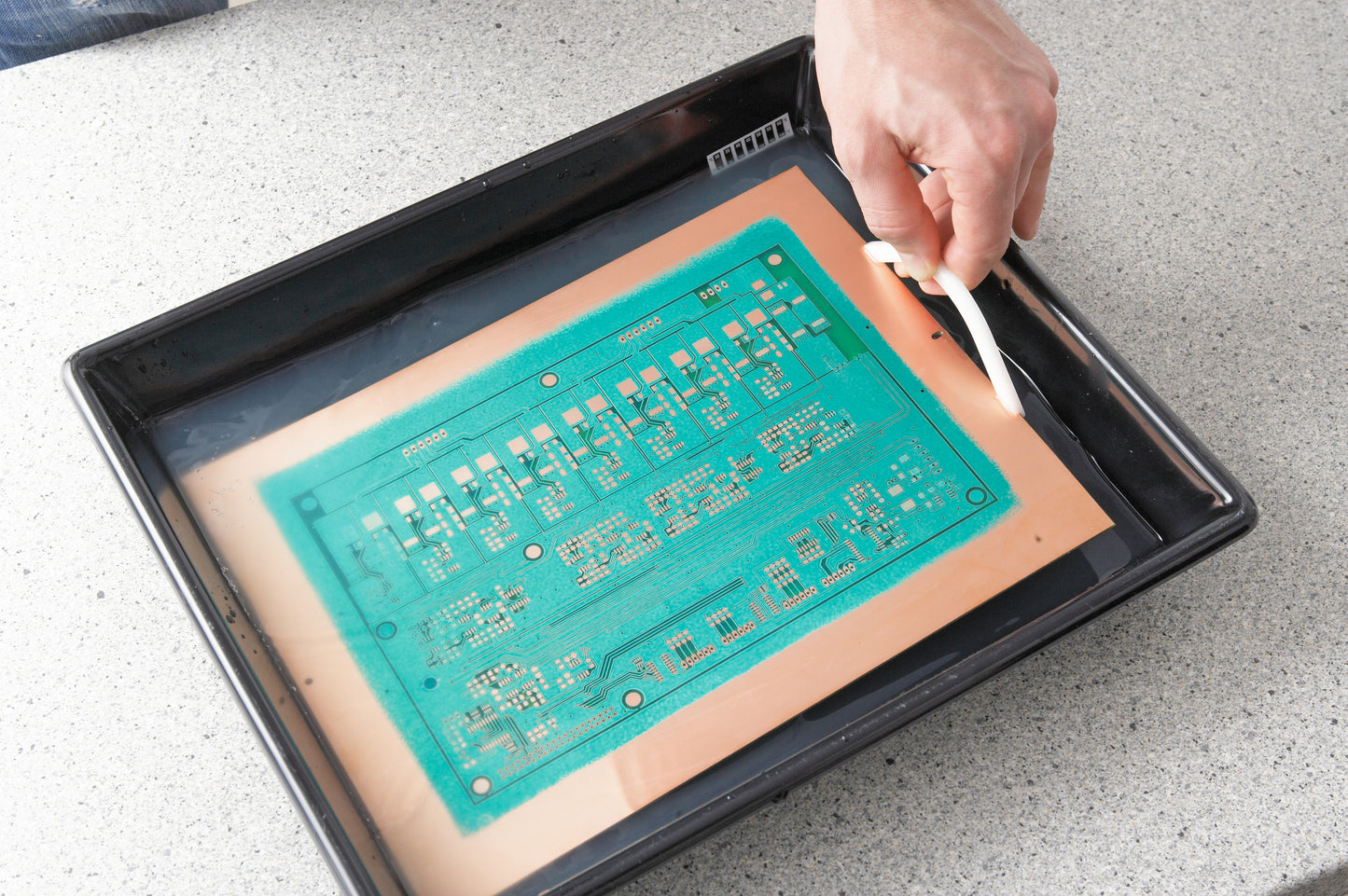 LPKF ProMask - professional solder resist mask can be quickly and effectively applied to already structured circuit boards. High adhesive solder resist mask is printed from the CAD program onto a transparent foil, transferred to the printed circuit board and developed.